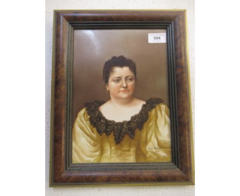Late 19th Century Continental porcelain plaque, painted head and shoulder portrait of a lady, signed Lodelodie Coulaud, dated