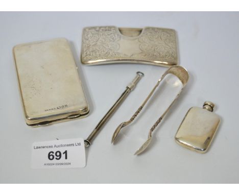 Engraved Sheffield silver visiting card case, silver cased notepad, swizzlestick, pair of sugar tongs and a miniature white m