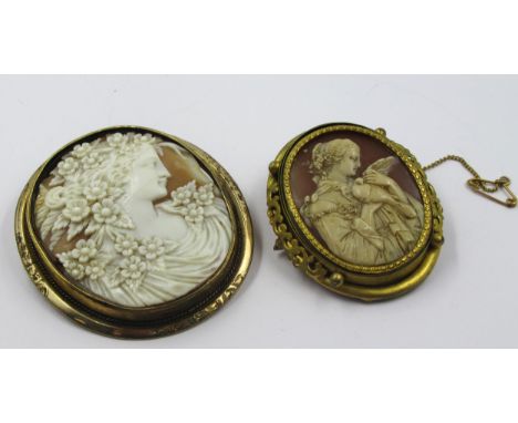 19th Century oval carved shell cameo brooch, lady with a dove, together with another similar portrait of a lady (at fault), b