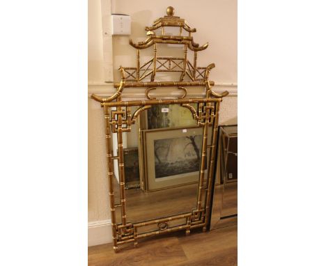 Good quality reproduction gilded composition wall mirror in Chinese Chippendale style146 x 80cm. In good overall condition. N