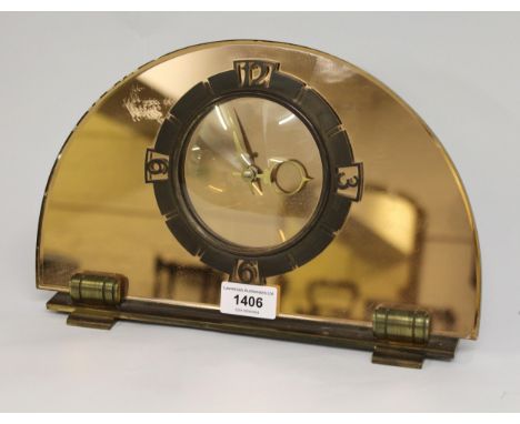 Art Deco pink mirror mantel clock with gilt brass mountsLosses to mirroring on edges to reverse and some small nibbles to edg