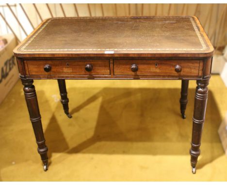 Small good quality 19th Century mahogany writing table, the green leather inset top with rounded corners above two frieze dra