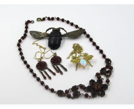 Pair of silver garnet inset drop earrings, together with a simulated garnet necklet, a scarab beetle brooch and a simulated o