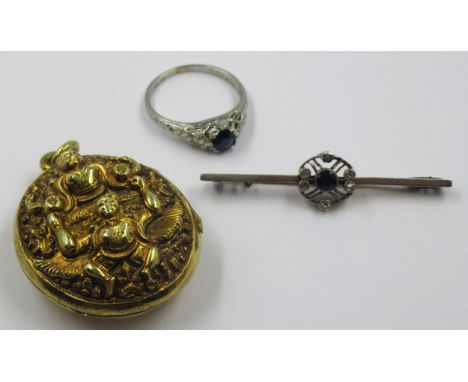 Edwardian bar brooch set sapphire and rose cut diamonds, together with a white metal ring set paste and an eastern silver gil