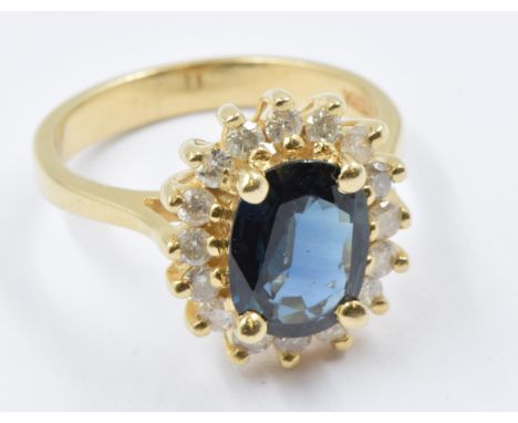 14ct yellow gold alexandrite (possibly synthetic) and diamond cluster ring, size K, 4gNot known if natural. Has a blue to sli