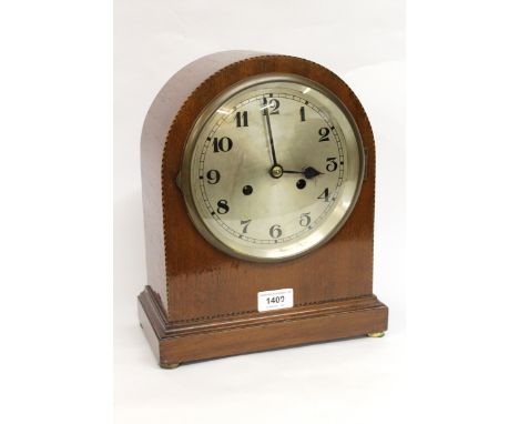 Edwardian mahogany and chequer line inlaid dome shaped two train mantel clock with silvered dial and Arabic numerals, togethe