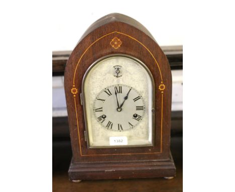 Mahogany inlaid lancet mantel clock, having silvered dial and Roman numerals with a two train movement striking on gongs, tog