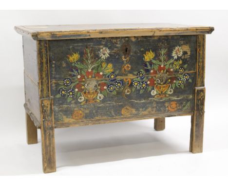 19th Century Continental painted pine trunk, the hinged plank lid above stile supports, 97cm wide