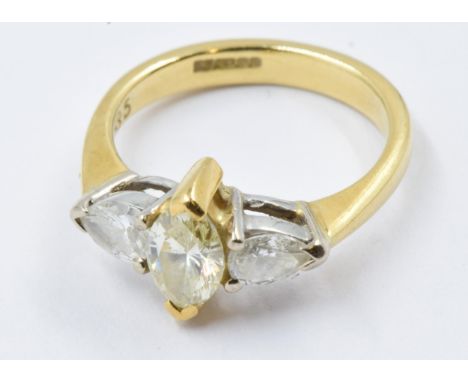 Small 18ct yellow gold three stone diamond ring, the central champagne stone of navette form flanked by two tear drop shaped 