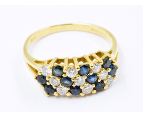 18ct Yellow gold sapphire and diamond dress ring set with seven diagonal bands