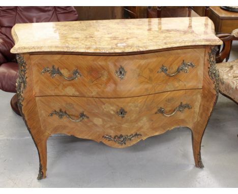 French kingwood marquetry and ormolu mounted commode, its marble top above two drawers on cabriole supports, 124cm wide