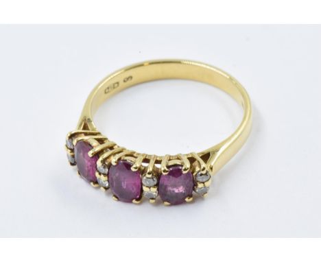 18ct Yellow gold ring set three rubies inter-spaced with eight small diamonds, size M, 3.1g