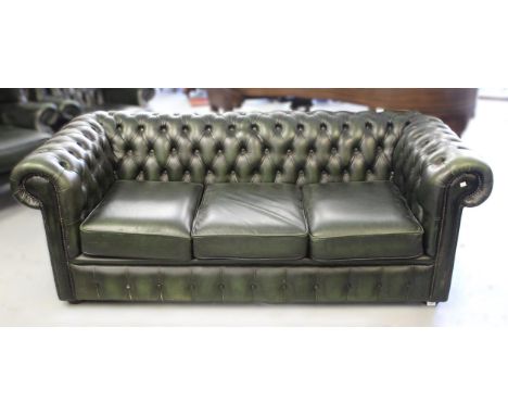 Green buttoned leather upholstered three seat Chesterfield type sofa, 195cm wide