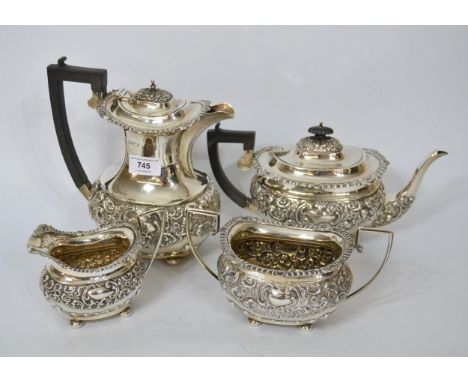 Early 20th Century silver four piece tea service of floral embossed design, Chester, 53oz t