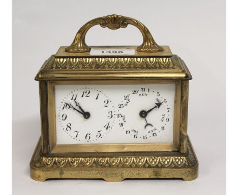 Gilt brass cased twin dial carriage type mantel clock, with enamel dial, having Arabic numerals and date/day dial, 13.5cm hig