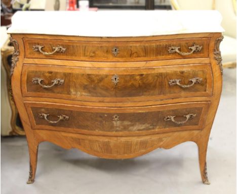 French kingwood and walnut ormulu mounted bombe shaped commode on cabriole supports (the marble top at fault)