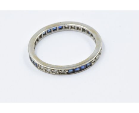 White metal sapphire and diamond set eternity ring, 2gLight scratching to shank. Mounts a little worn. Size N