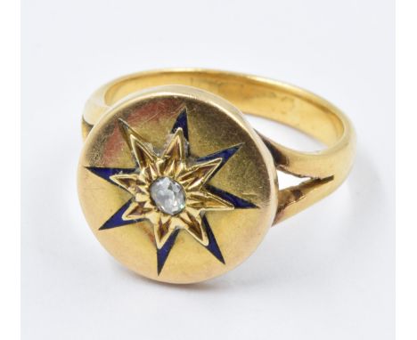 Victorian gold signet ring set with an old cut diamond within a blue enamel decorated star designSize K