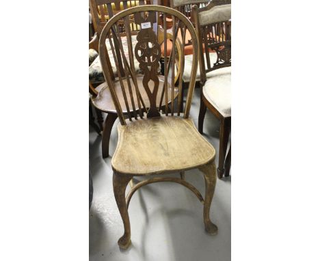 Late 19th / early 20th Century stick and wheel back kitchen chair on cabriole pad front supports with crinoline stretcher