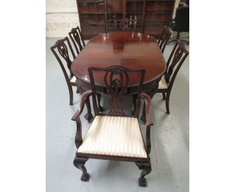 Chippendale style mahogany wind-out dining table with gadroon edge and two leaves, raised on carved cabriole supports with cl