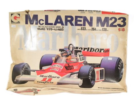 Model Kits - a vintage 1970s Japanese ' Eidai Grip ' 1/8 scale plastic model kit of a McLaren Formula One race car. The kit a