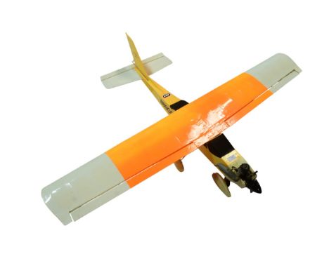 Radio Controlled Plane - a hand made scratch built model RC plane with engine, fuselage, wings and Futaba radio control trans