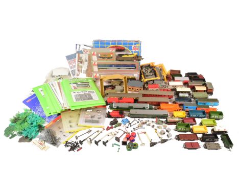 Model railway - a large collection of OO Gauge engines, rolling stock and trackside accessories. Lot includes Lima / Triang /