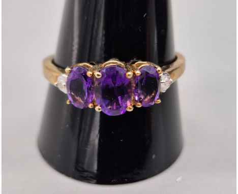 9ct yellow gold, amethyst and diamond stone ring. [Ring size T] [2.10grams] 