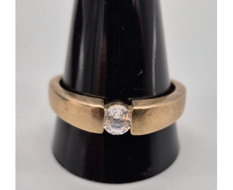 9ct yellow gold gents ring fitted with an Ice Zircon Stone. [Ring size W] [4.30Grams]