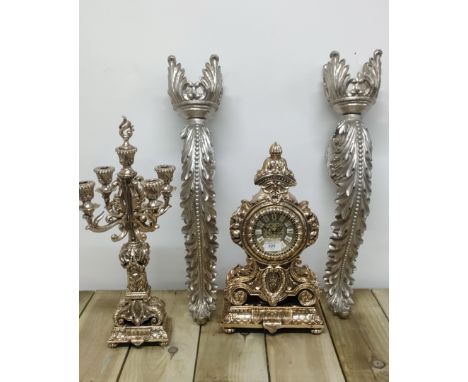 Ornate Andore mantle clock along with four branch candleabra along with two wall sconce's 