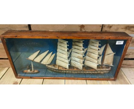 Antique raised relief galleon ship model within a glass and wood cabinet. [33x72x9.5cm] 