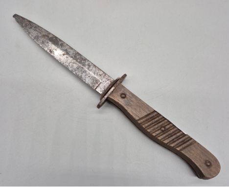 WWI German army issue boot knife signed ErnnnWald Rhein [5 3/4 inches blade with wooden hilt. 
