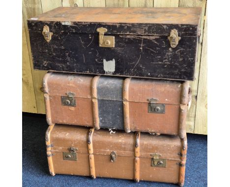 Three various travel trunks; Two canvas and wooden bound trunks and metal trunk. 
