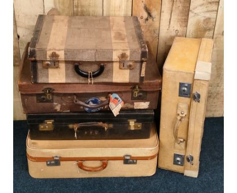 A collection of five antique and vintage travel cases; leather &amp; pig skin cases 