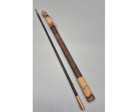 A Military swagger stick with fitted brass top- initialled 'WM' along with two antique sword scabbards 