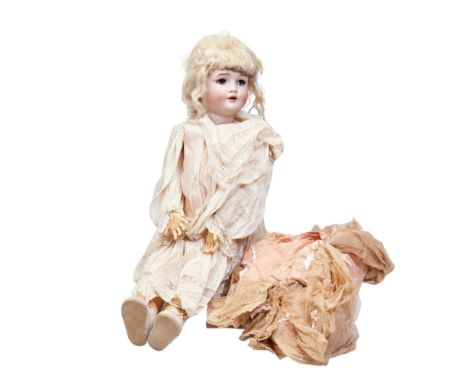 A VINTAGE HANDWERCK DOLL, bisque head with mohair wig, on a jointed composition body 