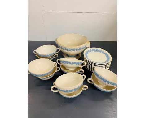A Selection of Wedgwood embossed Queens ware ten place soup bowls, saucers and a tureen.