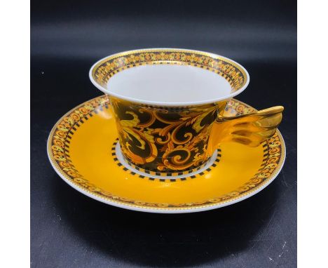 A Boxed Versace Tea set to include milk jug, sugar bowl and two cups and saucers