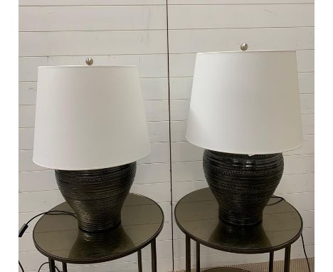 A pair of large textured ceramic table lamps 