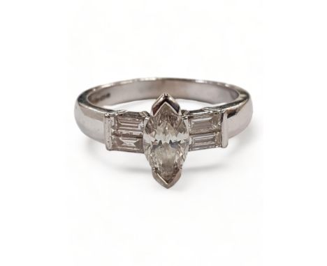 18 CARAT WHITE GOLD AND DIAMOND RING WITH MARQUISE CENTRE STONE CIRCA 1.2 CARAT OF DIAMONDS TOTAL