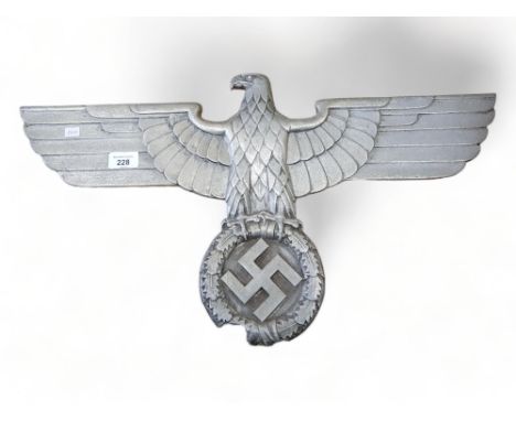 NAZI CABSIDE DEUTSCHE REICHSBAHN EAGLE. POSSIBLY FROM EITHER A CLASS K50 2-10-0 STANDARD WAR LOCOMOTIVE OR AN ELECTRIC 2-4-4-