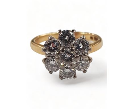 18 CARAT YELLOW GOLD AND DIAMOND 7 STONE DIAMOND RING WITH CIRCA 1.25 CARAT OF DIAMONDS