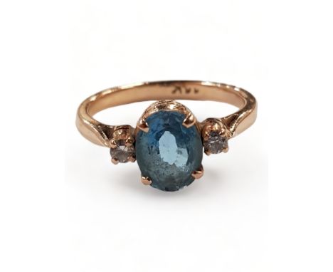 14 CARAT YELLOW GOLD BLUE TOPAZ AND DIAMOND RING