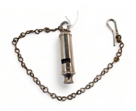 A GARDA UNIFORM WHISTLE AND CHAIN MARKED GARDA 'SIOCADA' FIRST ISSUED 1922/40. EXCELLENT CONDITION
