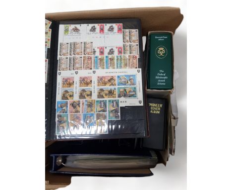 BOX OF STAMP ALBUMS AND FIRST DAY COVERS 