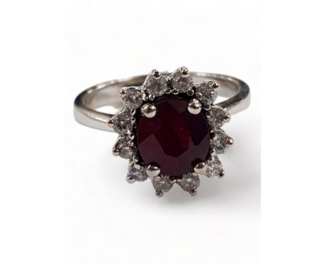 18 CARAT YELLOW GOLD DIAMOND AND RUBY RING WITH CIRCA 0.25 CARAT OF DIAMONDS