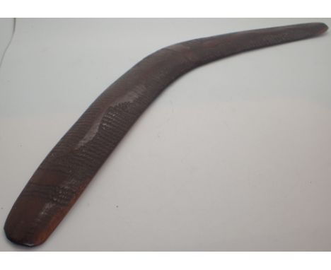 Antique aboriginal wooden boomerang with snake and textured decoration L: 50 cm