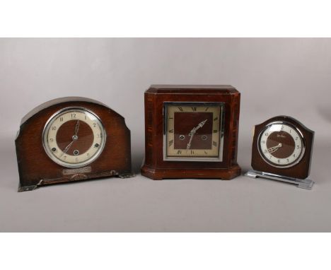 Three wooden mantel clocks comprising of two Bentima clocks one of which was presented to John Reid on the occasion of his ma