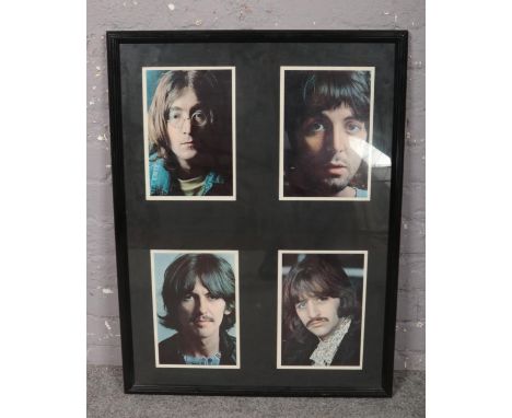 A framed set of four The Beatles portraits.  