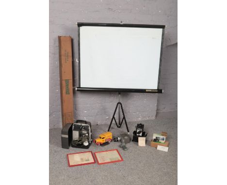 A selection of mostly photographic and film equipment comprising of, a 'Da-Lite' projector screen, a 'Bell &amp; Howell' Supe